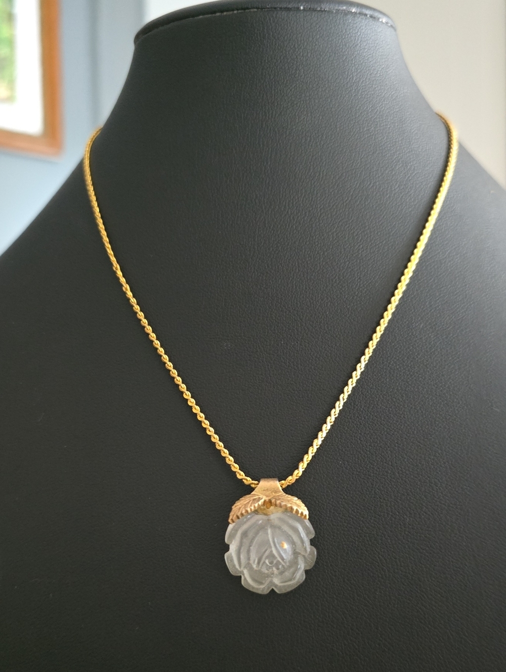 Gold-Tone Necklace with Carved White Flower Pendant
